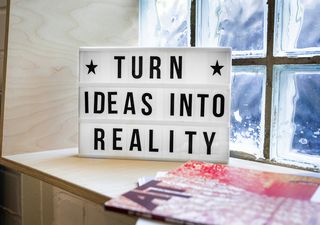 Schild mit Aufschrift Turn ideas into reality