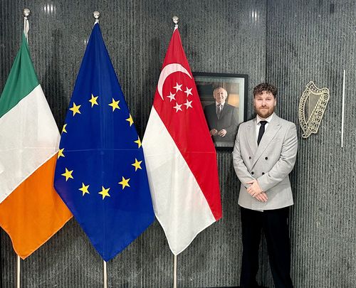 Flo close to flags in the irish embass